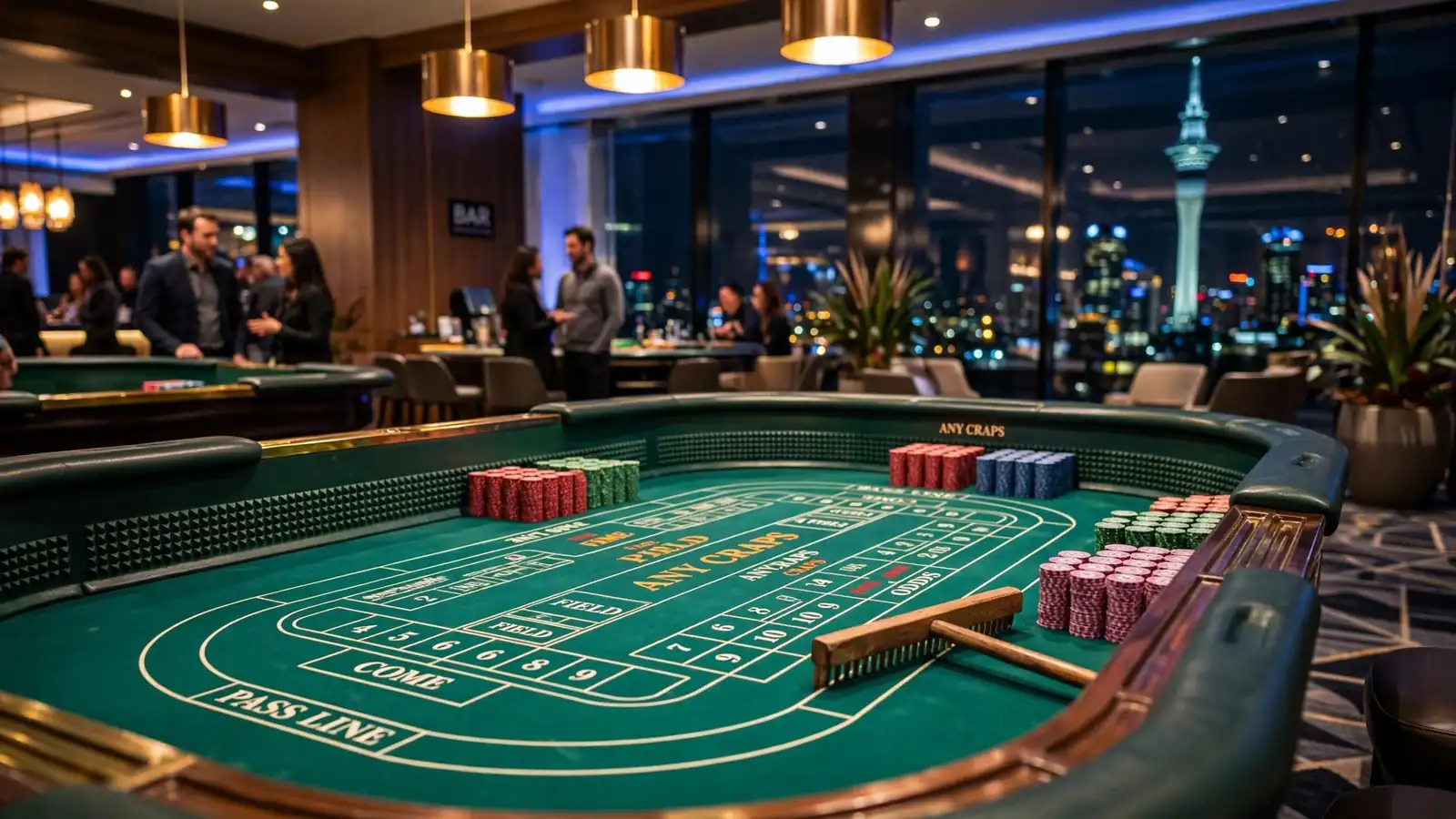 Craps table inside a New Zealand casino with chips and Auckland skyline